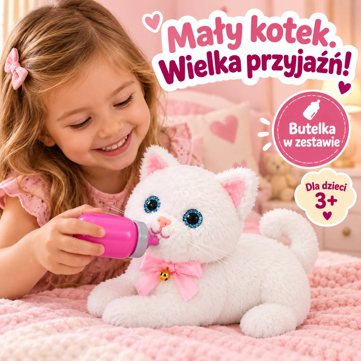 Dziecko karmi białego interaktywnego kotka butelką Dziecko karmi białego interaktywnego kotka butelką