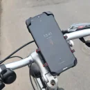 UCHWYT ROWEROWY ZACISKOWY NA TELEFON MONTOWANY NA KIEROWNICĘ ROWERU METAL
